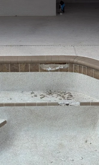 demolition of pool steps and coping